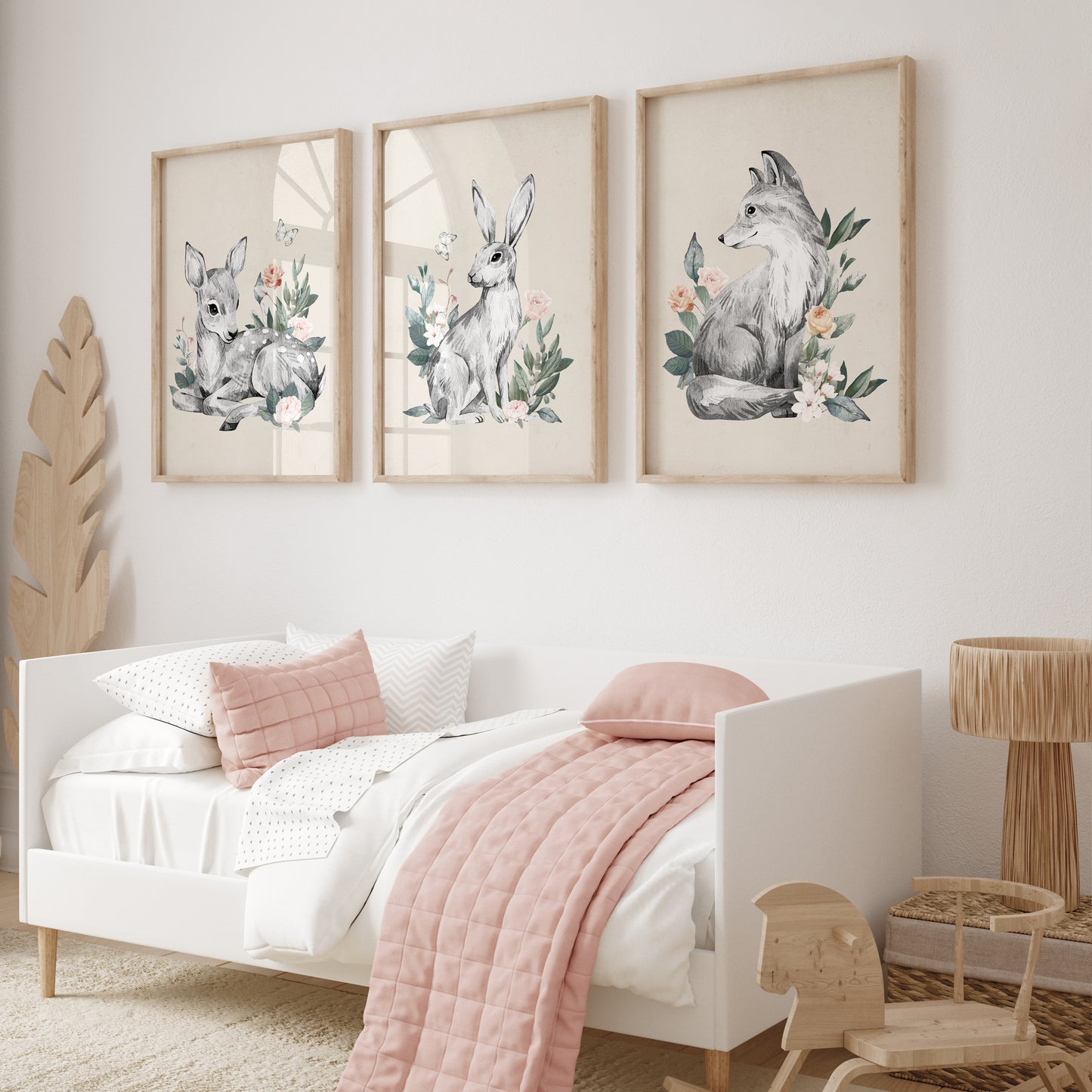 Girls room woodland nursery prints with pencil drawn animals and green foliage and pink flowers, all on cream backgrounds, 3 set