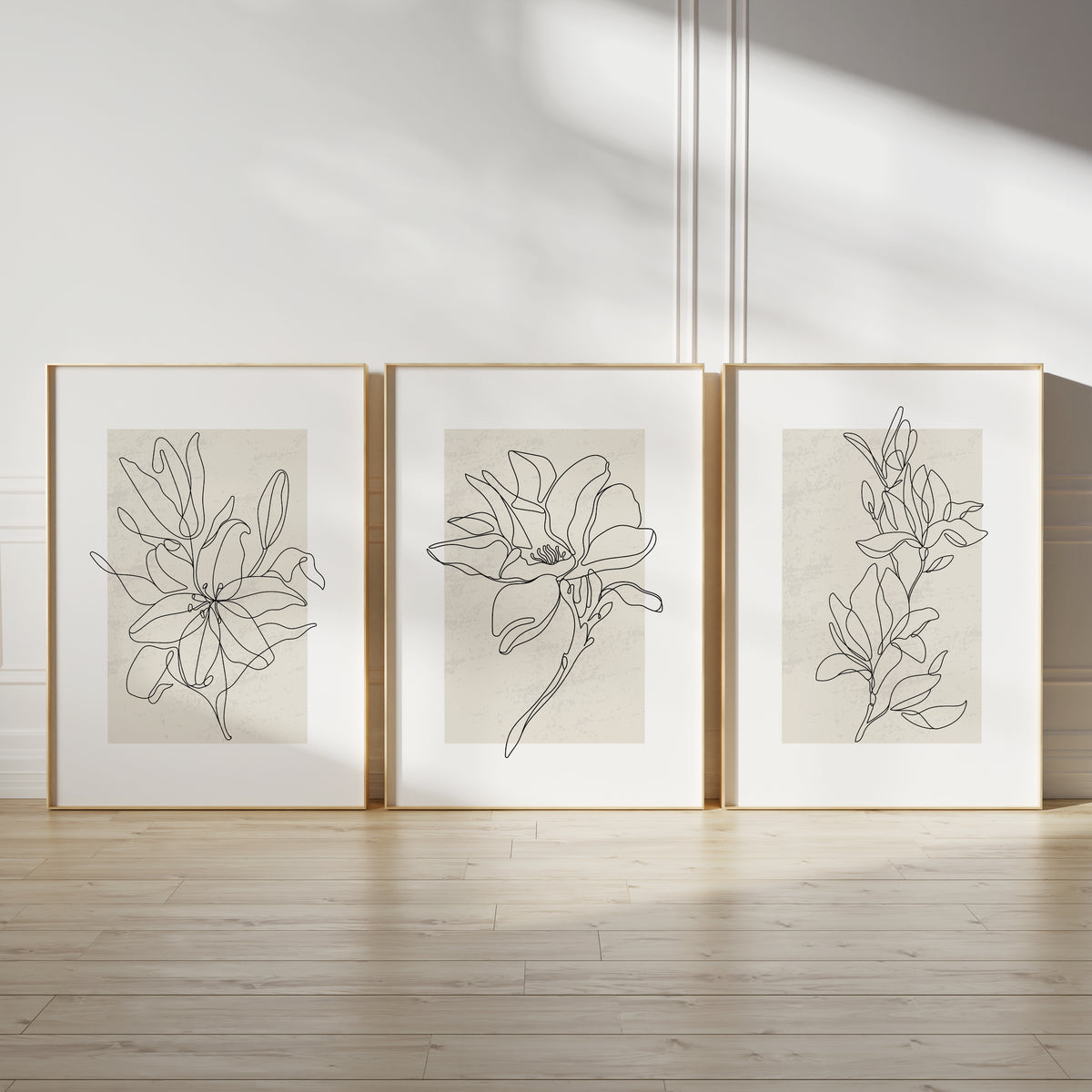 neutral botanical line art prints, plant line art on beige backgrounds with white borders, et of 3 wall art prints