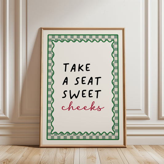 Sage green bathroom print with quote "take a seat sweet cheeks"