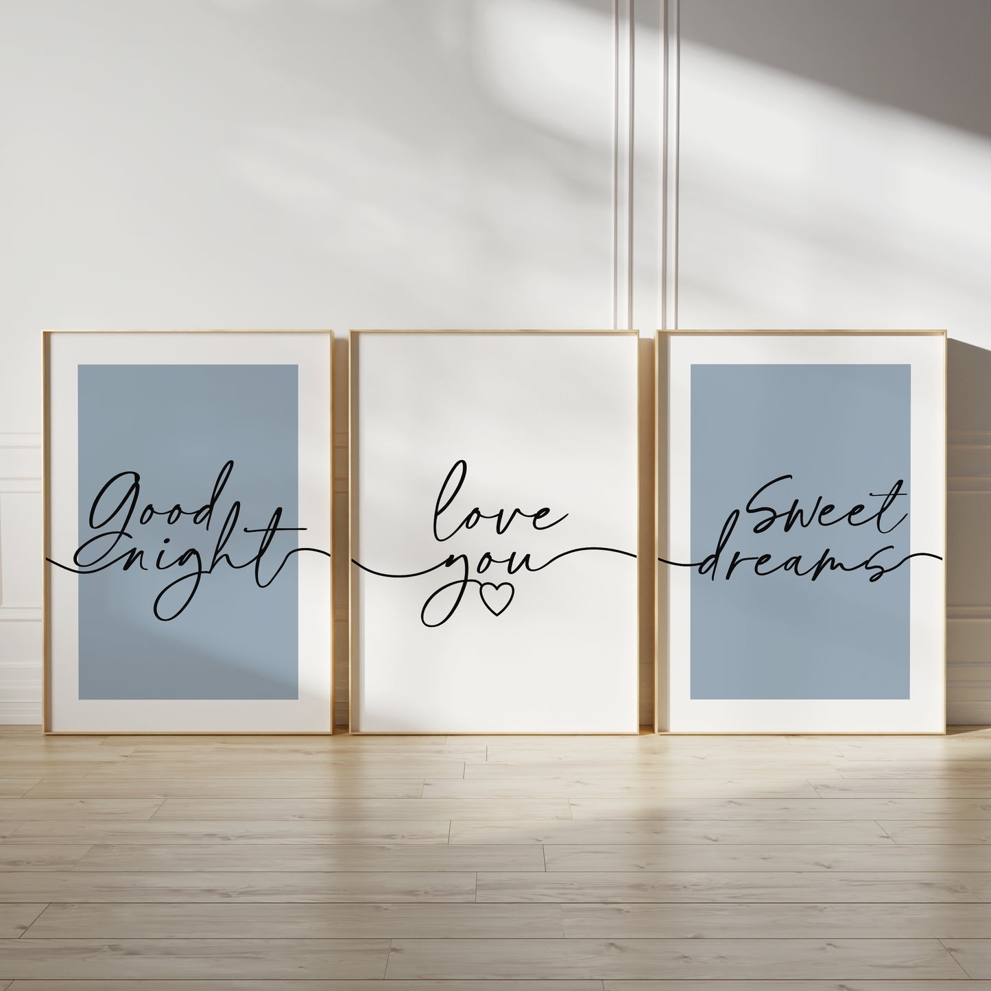 above bed wall art in blue