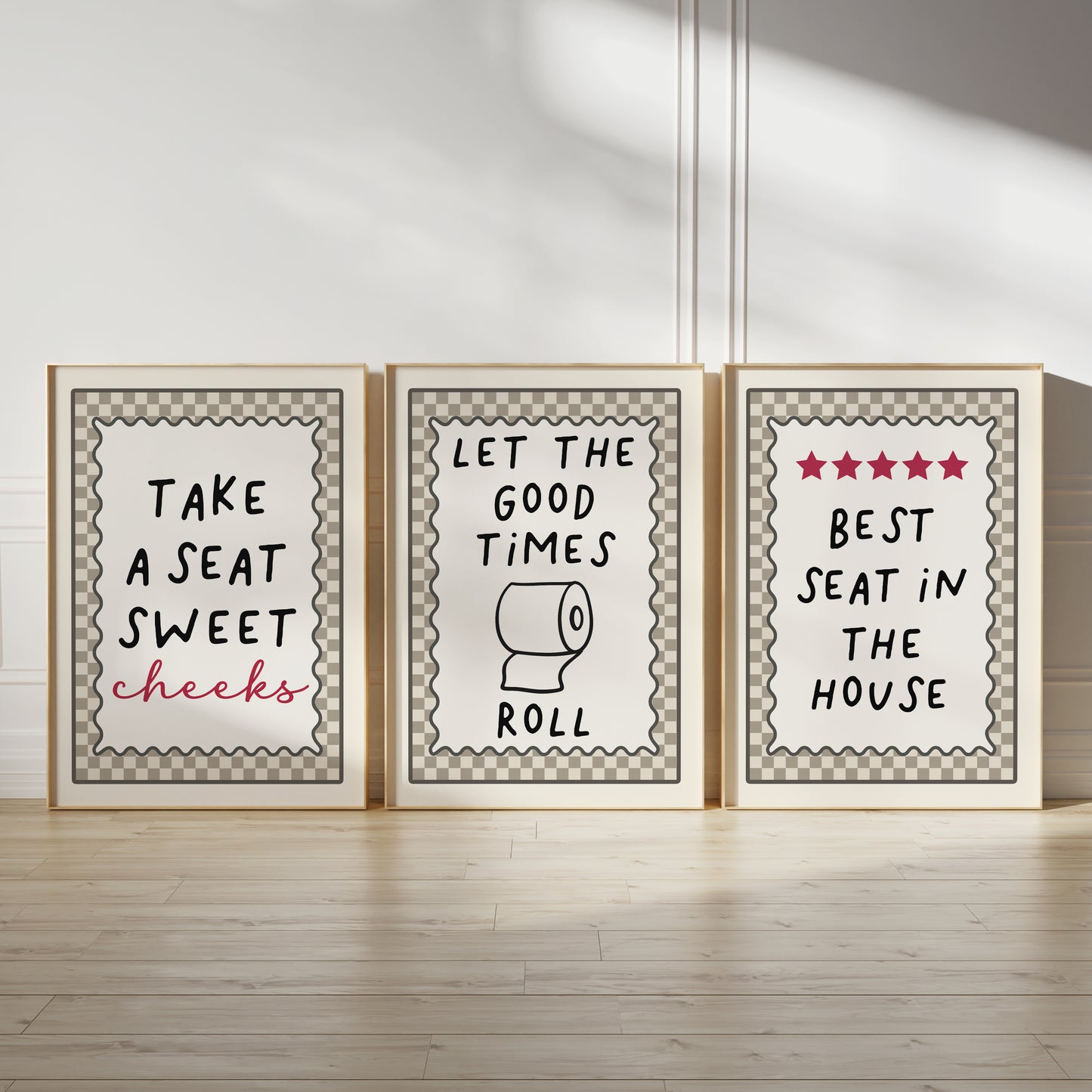 set of three funny quote bathroom wall art prints, each with a beige chequered border, let the good times roll