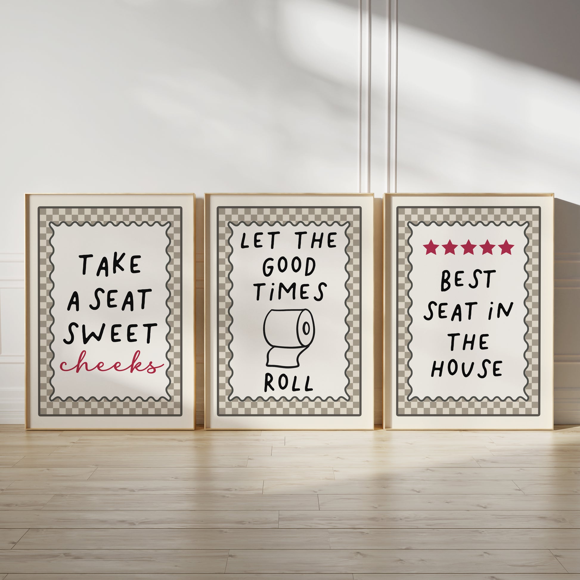 set of three funny quote bathroom wall art prints, each with a beige chequered border, let the good times roll