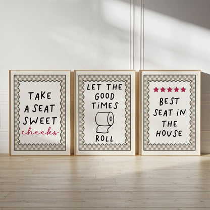 set of three funny quote bathroom wall art prints, each with a beige chequered border, let the good times roll