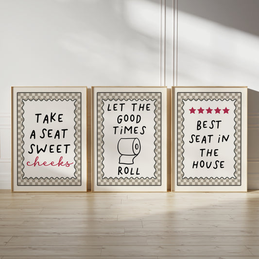 set of three funny quote bathroom wall art prints, each with a beige chequered border, let the good times roll