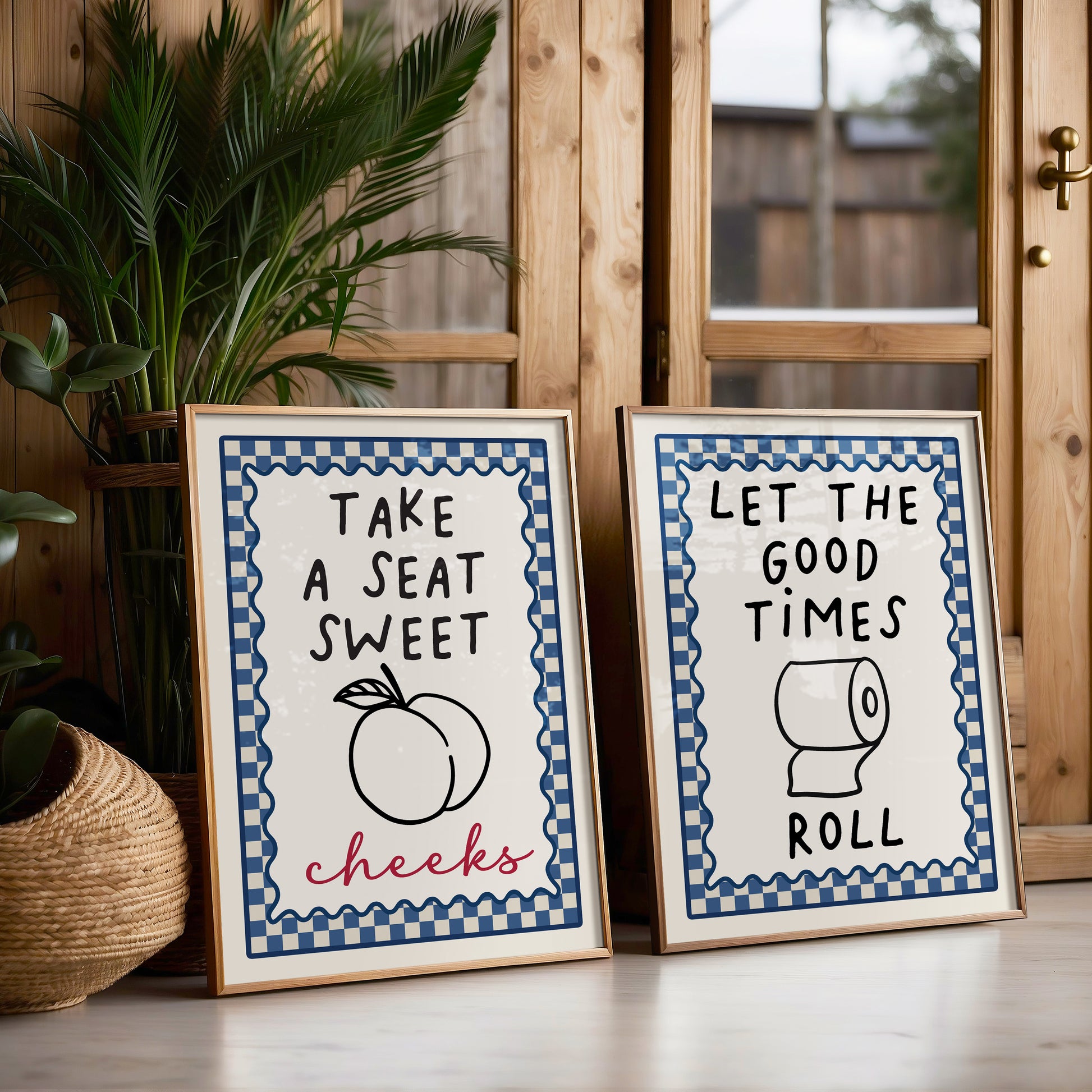 Set of 2 blue bathroom prints, with navy blue chequered borders and funny bathroom quotes, let the good times roll