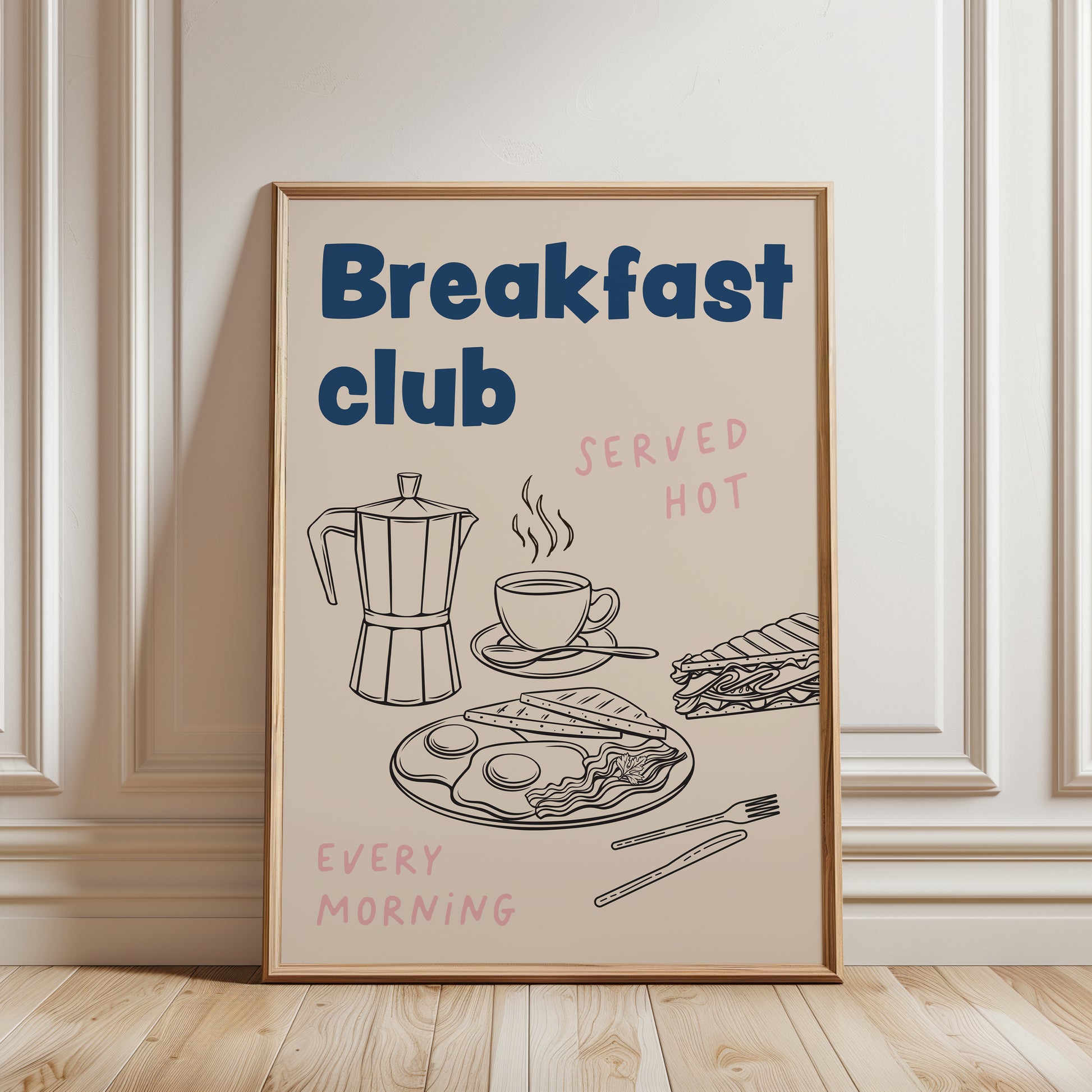 An unframed art print with blue text reading 'Breakfast club', and black line drawings of a coffee maker, cup, sandwich, eggs, bacon, and utensils, with pink text reading 'SERVED HOT' and 'EVERY MORNING'.