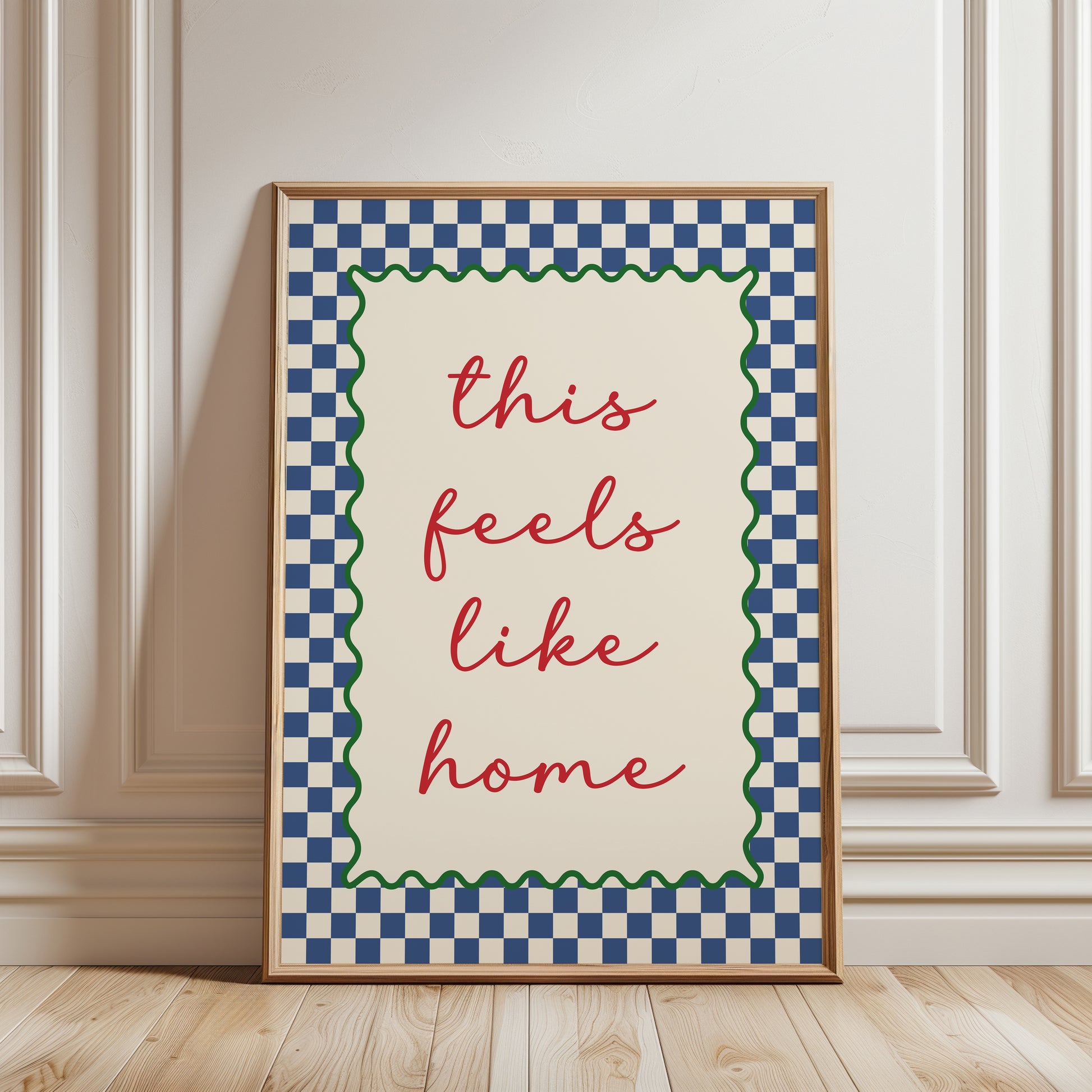 hallway  poster with quote "this feels like home" in pink with a chequered border