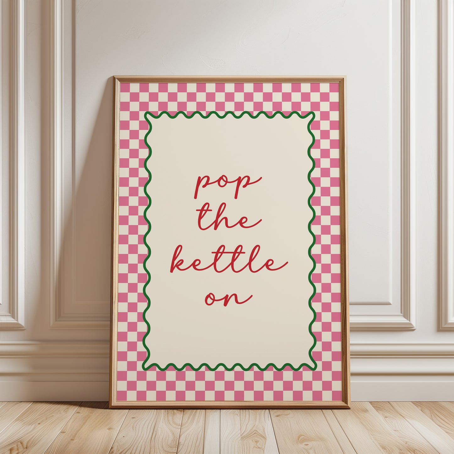 Pink home decor, wall art print with quote "POP THE KETTLE ON" with a funky chequered border for kitchen wall or dining room wall