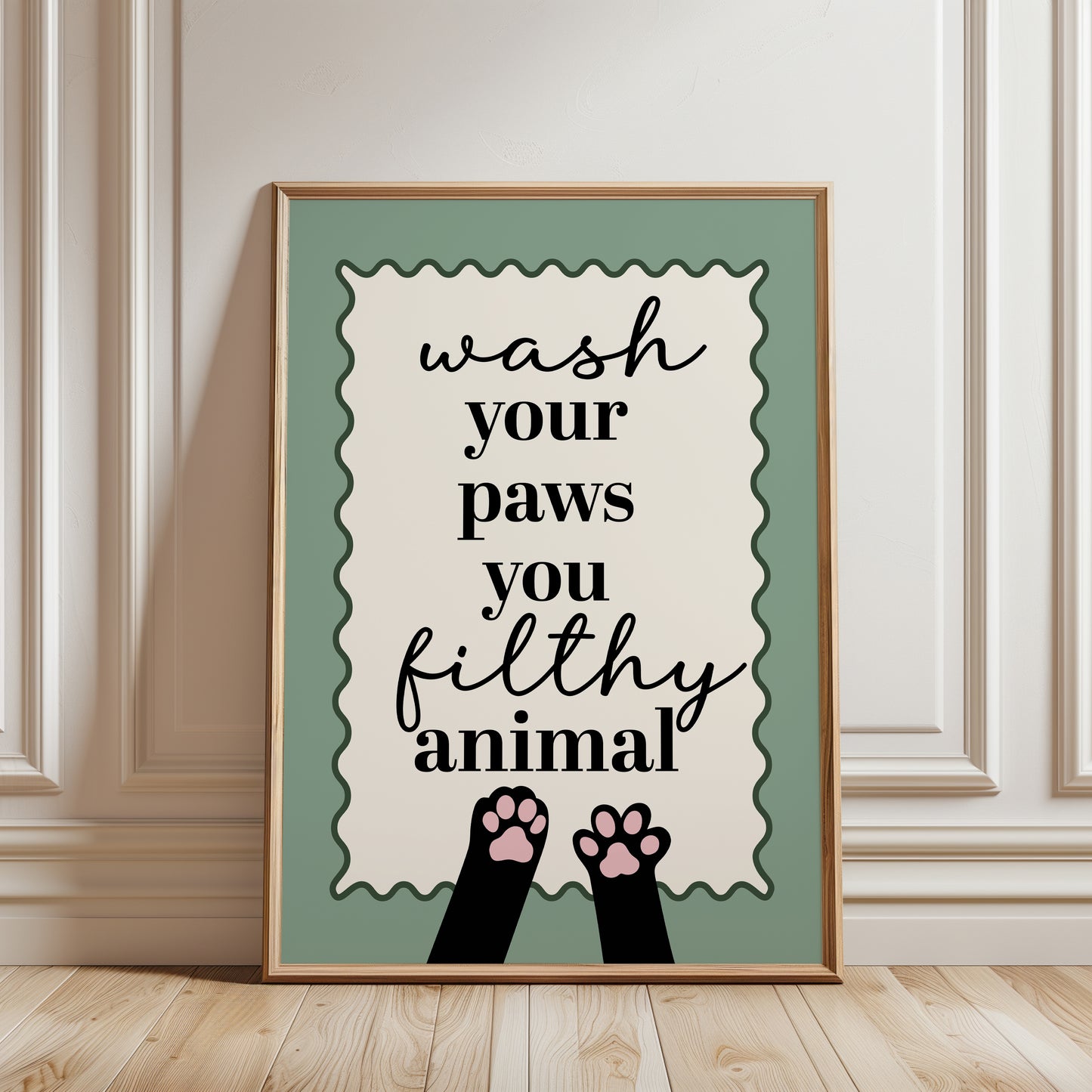 Sage green bathroom wall art print with funny quote "WASH YOUR PAWS YOU FILTHY ANIMAL" and illustrated cat paws 