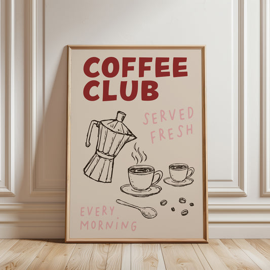 unframed coffee-themed art print. The print features the words 'COFFEE CLUB' in large red letters, with hand-drawn illustrations of a moka pot, cups, coffee beans, and a spoon on a cream background.