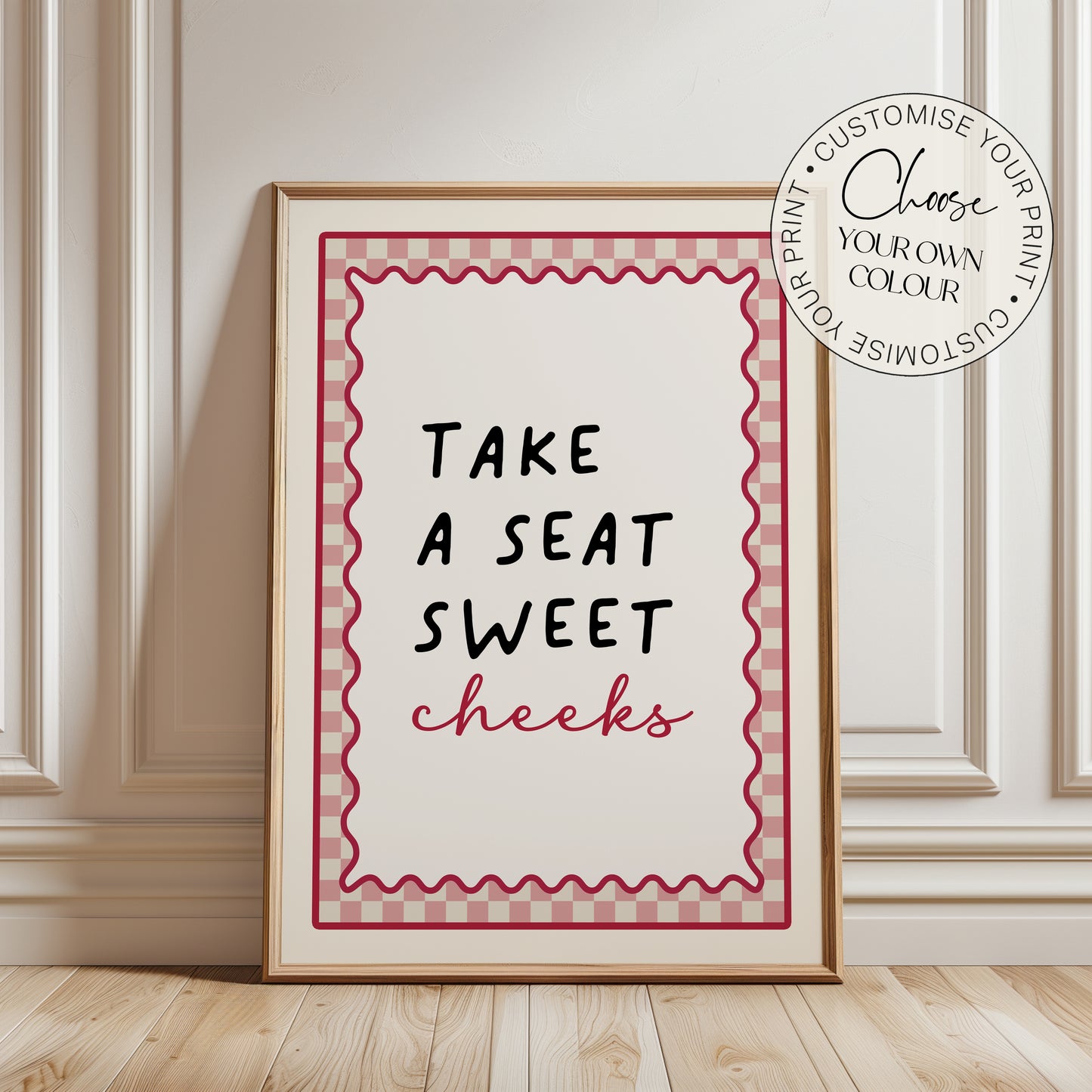 Pink bathroom print with funny quote, take a seat sweet cheeks and a chequered border. Funky wall art