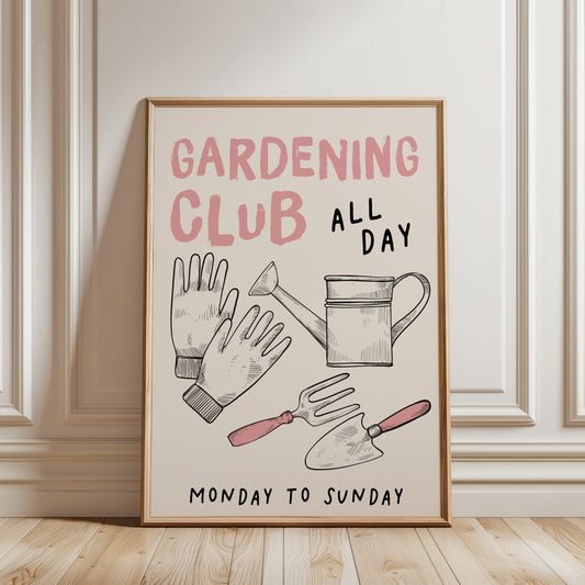 An unframed gardening-themed art print. The print features teal and black text reading 'GARDENING CLUB ALL DAY' and 'MONDAY TO SUNDAY' with illustrated gardening tools including gloves, a watering can, a fork, and a trowel. Gift for her.