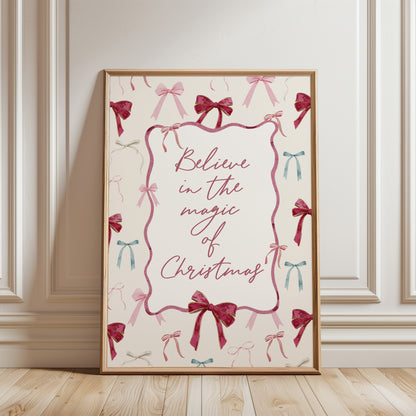 coquette Christmas print for girls room, festive bows and quote "Believe in the magic of Christmas"