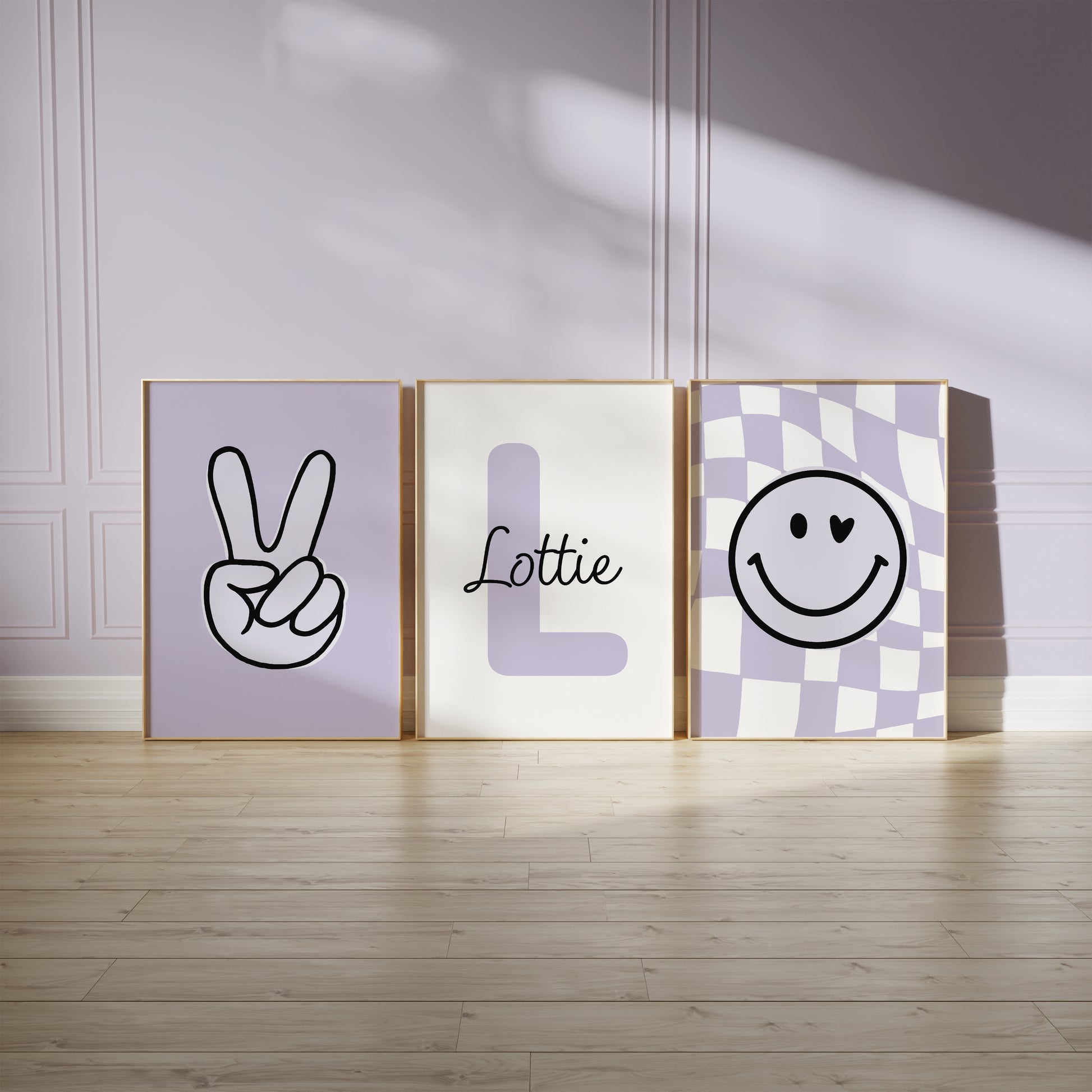 Girls room prints in lilac, featuring victory sign, smiley fave on chequered background and personalised name