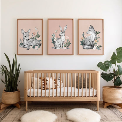 Girls woodland nursery prints, pencil drawn animals including deer, rabbit and fox with flowers surrounding them on nude pink backgrounds