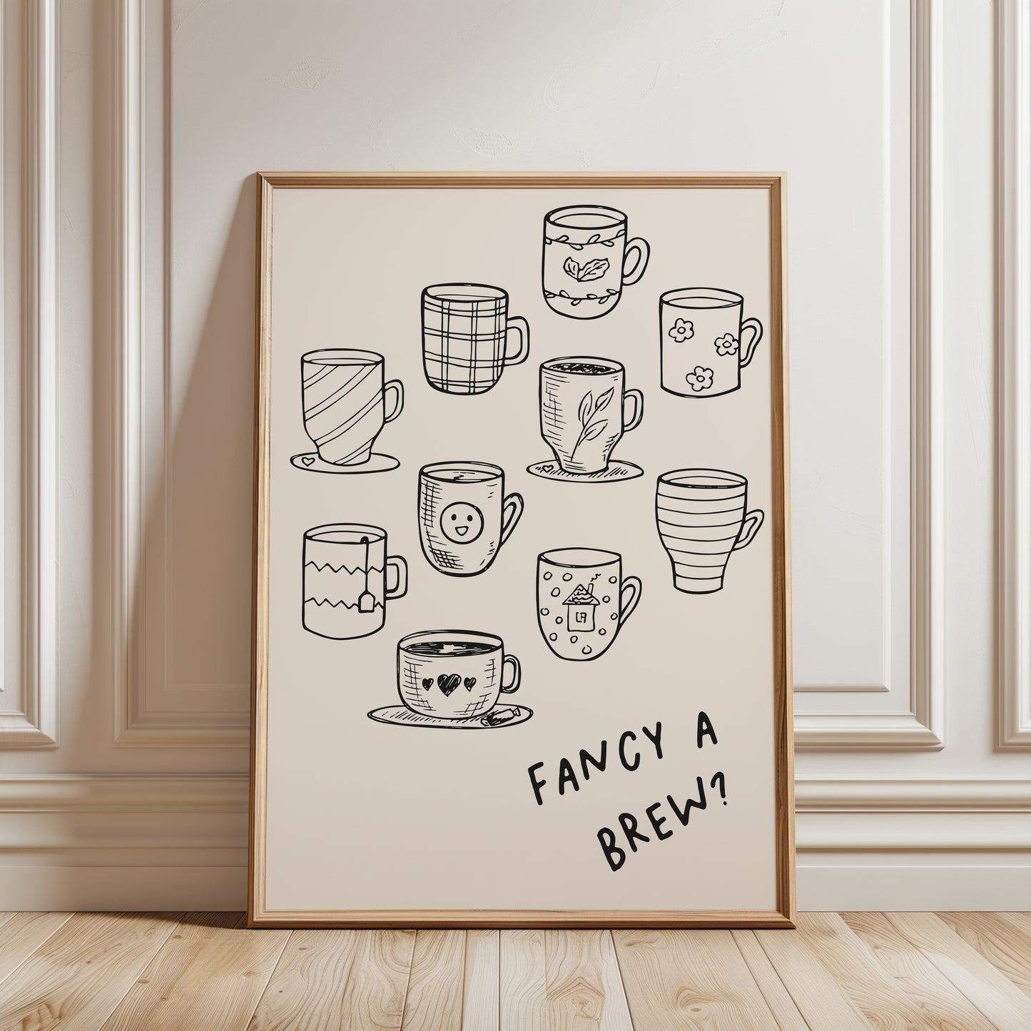 Beige and black kitchen wall art print with cup iillustrations and text reading FANCY A BREW