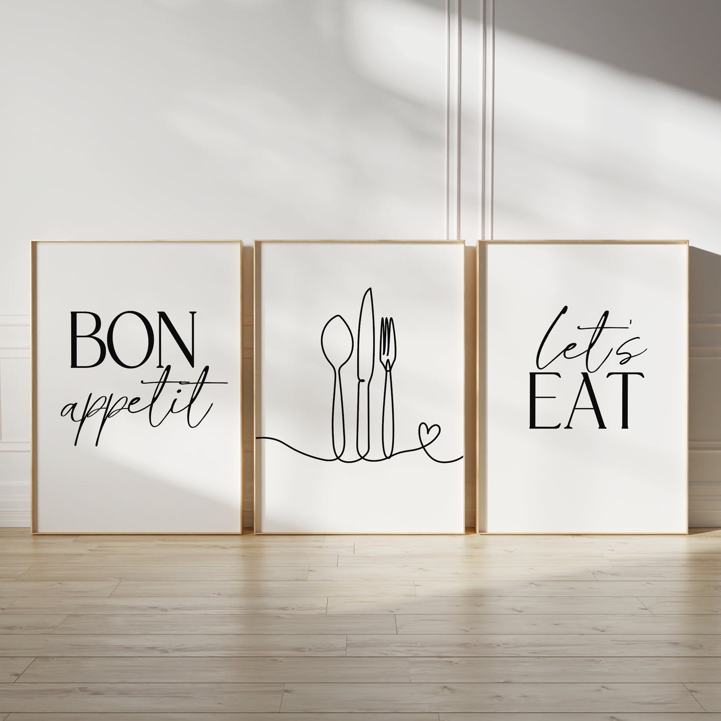 Minimalist kitchen wall art set, set of three prints with quote BON APPETIT, LETS EAT and line drawn cutlery with love heart on the middle print