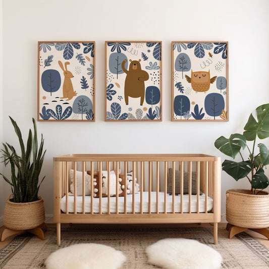 Three nursery woodland prints in blue with rabbit, bear and owl