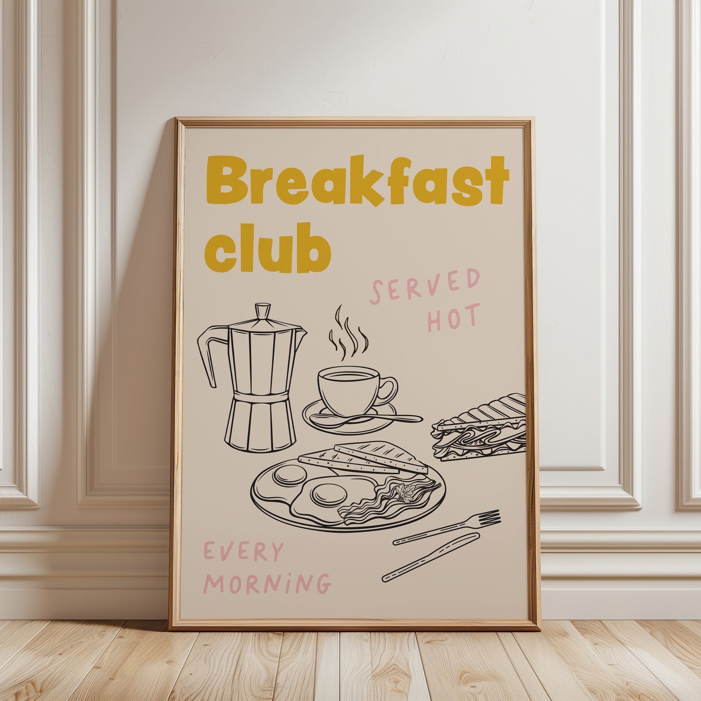 An unframed art print with ochre yellow text reading 'Breakfast club', and black line drawings of a coffee maker, cup, sandwich, eggs, bacon, and utensils, with pink text reading 'SERVED HOT' and 'EVERY MORNING'.