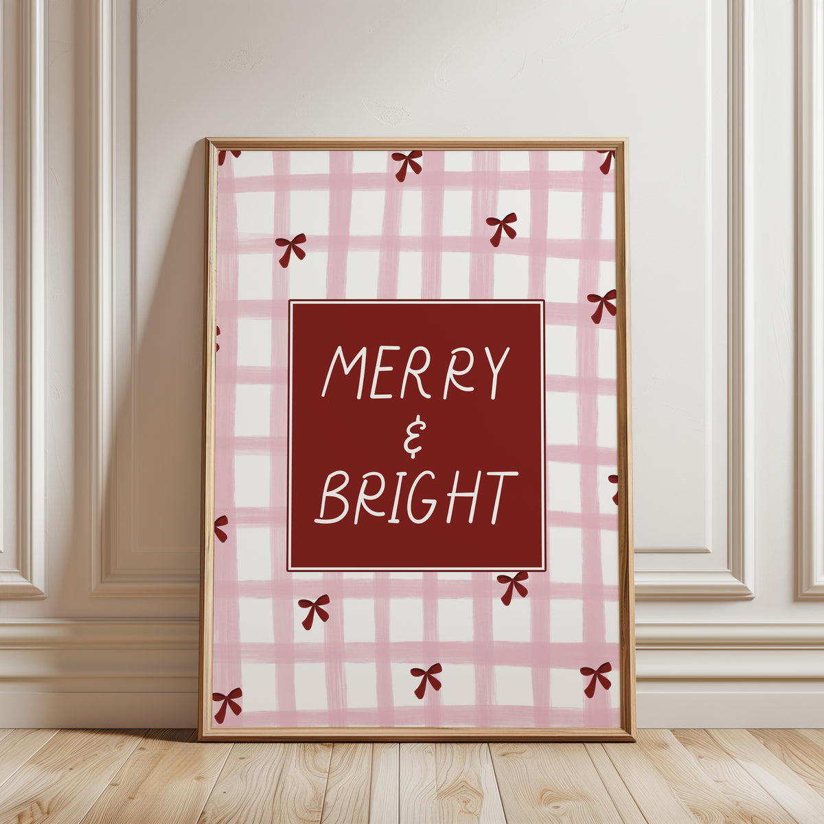 Christmas print with festive saying MERRY & BRIGHT on a pink and white chequered background with red bows, modern Christmas home decor