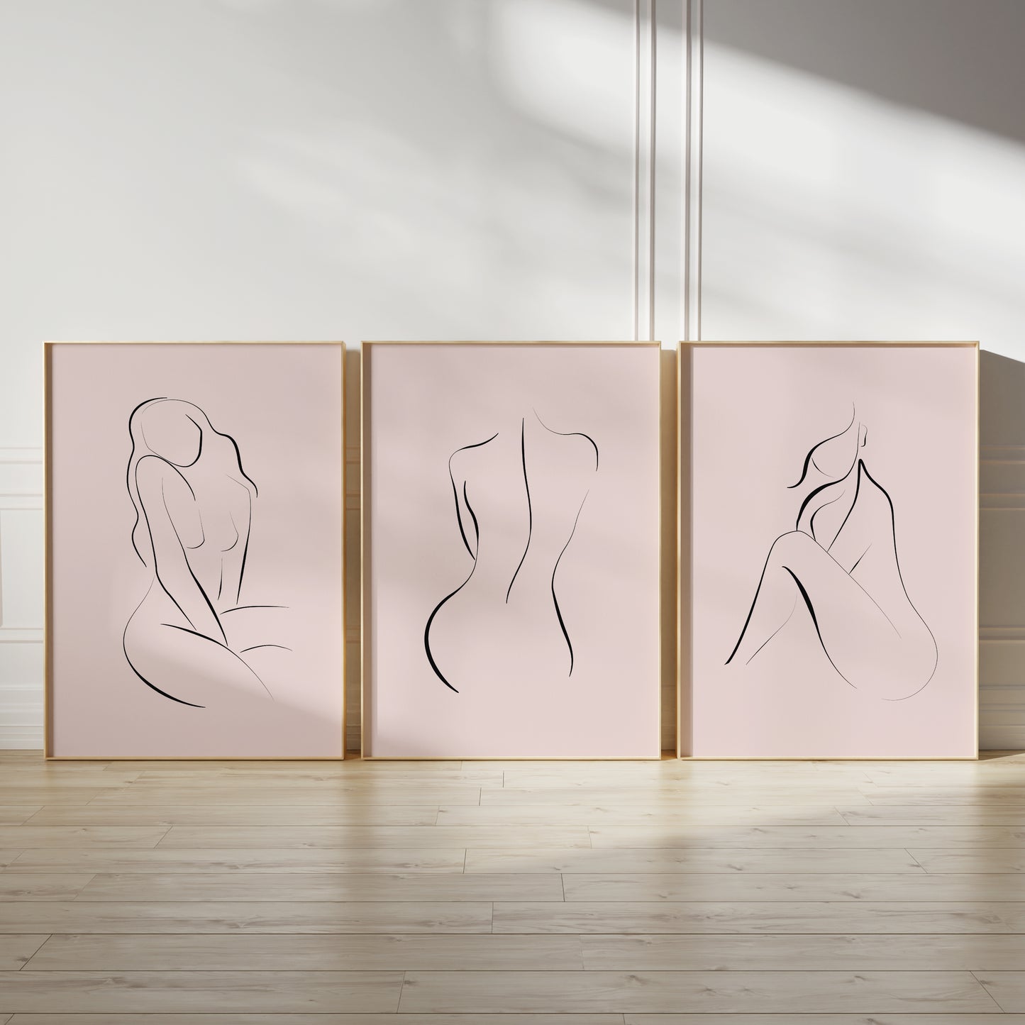 Pink bedroom prints in a minimalist style with black line art of women
