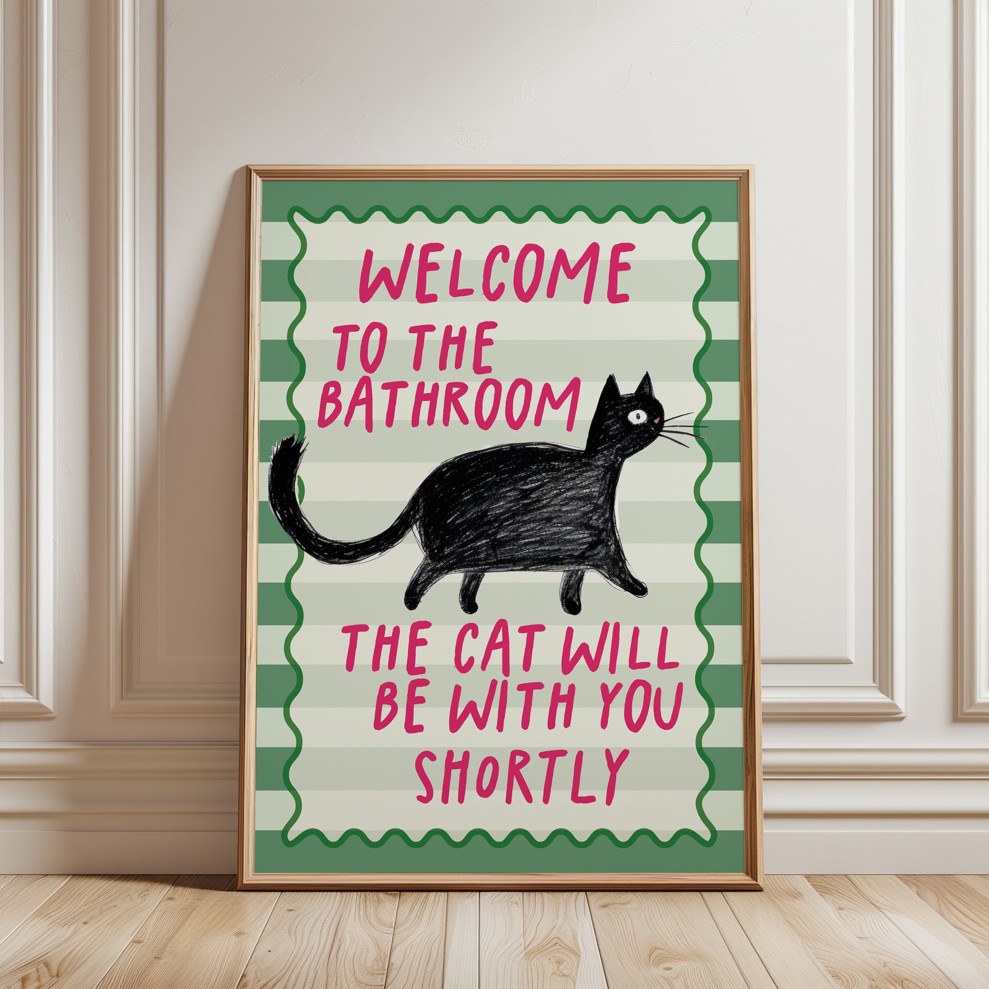 Sage green funny bathroom cat wall art print featuring a black cat and the quote "Welcome to the Bathroom, the Cat Will Be With You Shortly".