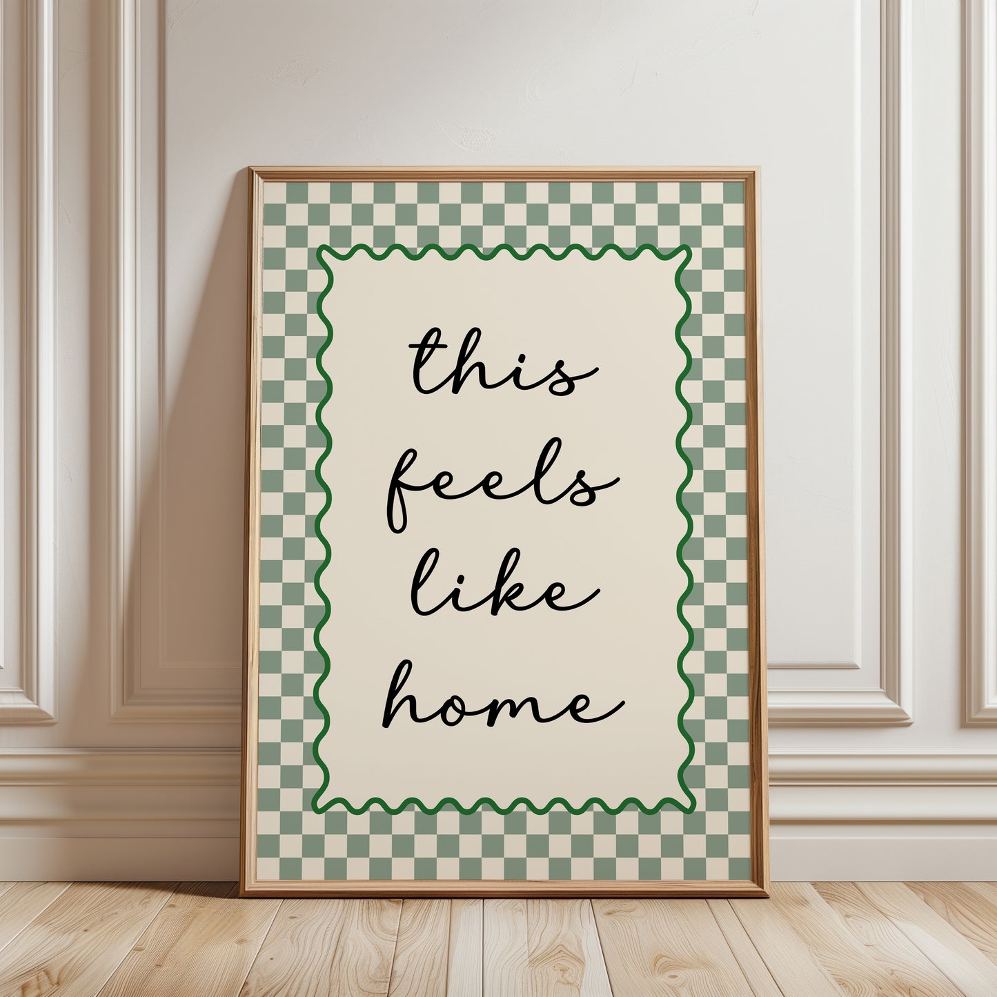 Modern hallway gallery wall art print with quote "this feels like home" in sage green with a chequered border