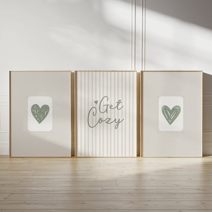sage green wall art prints, featuring sage green love hearts on beige embossed paper effect backgrounds and quote "get cozy" ina script font in sage green on a textured look stripe background in neutral beige