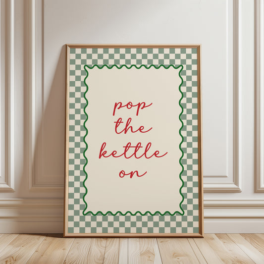 Sage green kitchen print with quote "POP THE KETTLE ON" with a funky chequered border
