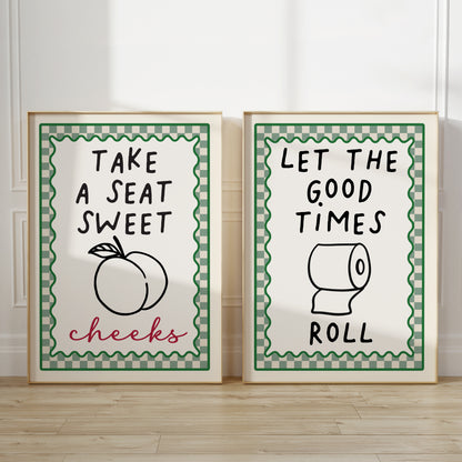 set of 2 sage green bathroom wall art prints each with chequered borders and funny quotes, print one reads "take a seat sweet cheeks" print 2 reads "Let the good times roll"