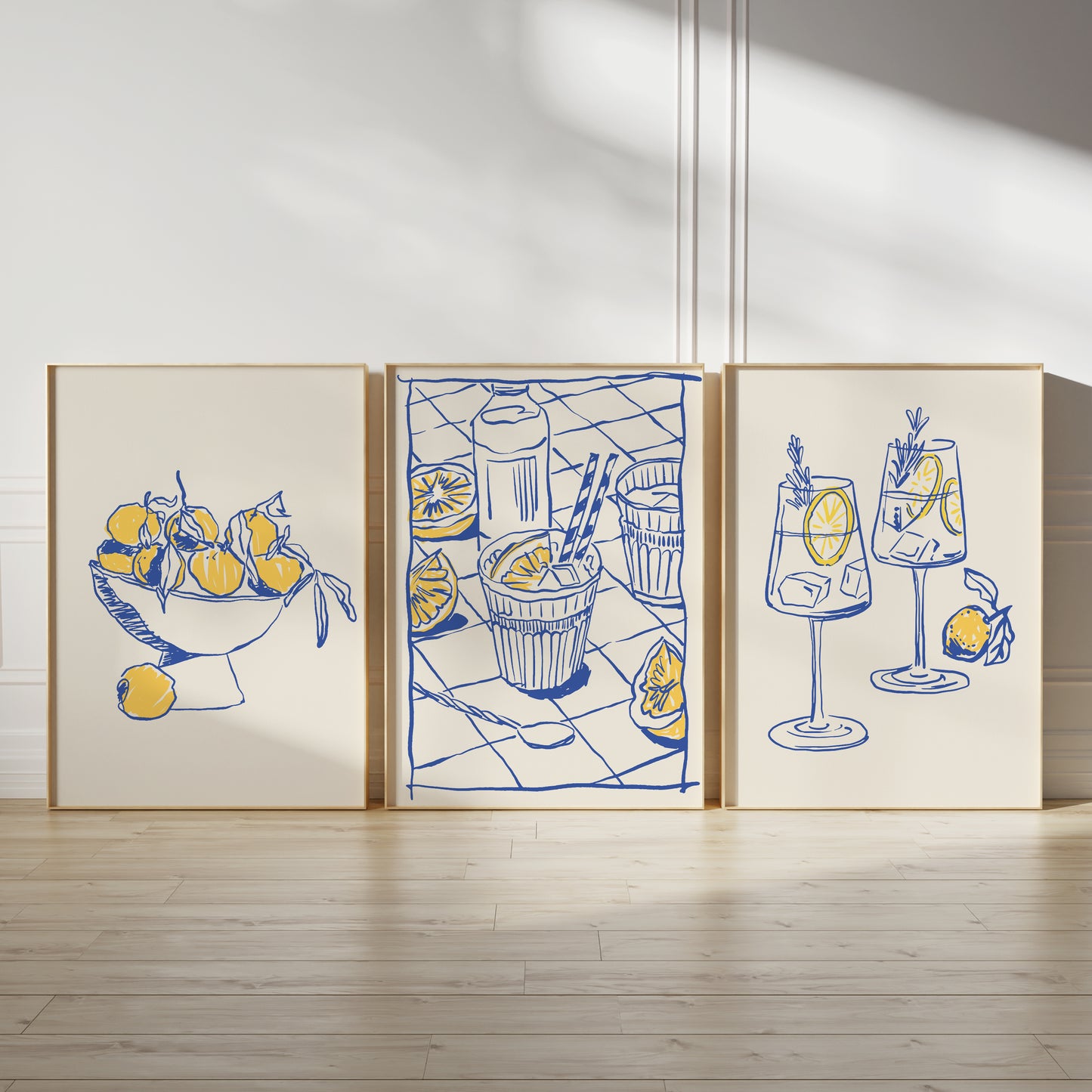 Set of 3 kitchen prints in shades of blue and yellow on light beige backgrounds