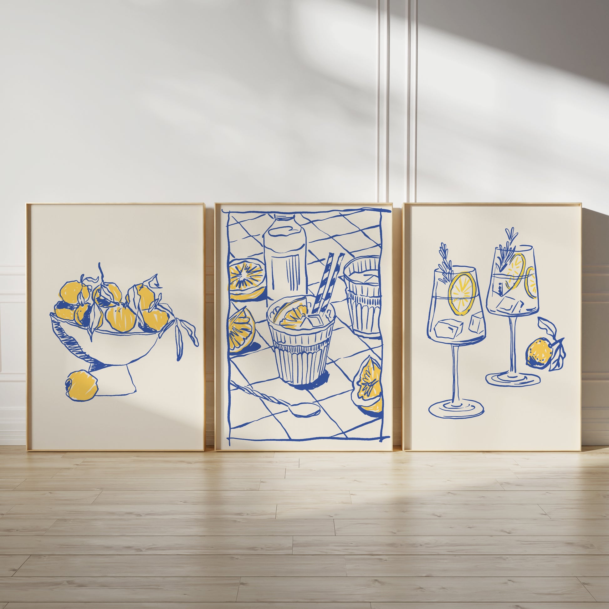 Set of 3 kitchen prints in shades of blue and yellow on light beige backgrounds