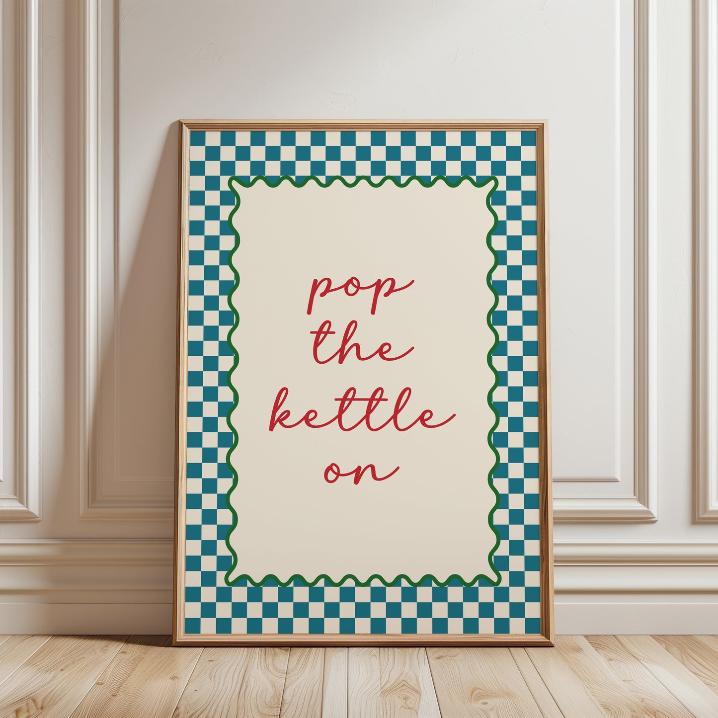 Teal kitchen print with quote "POP THE KETTLE ON" with a funky chequered border