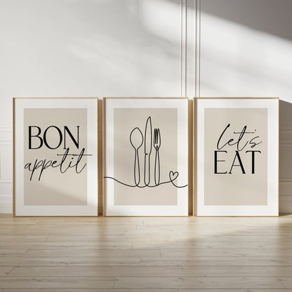 Warm beige kitchen wall art set, set of three prints with quote BON APPETIT, LETS EAT and line drawn cutlery with love heart on the middle print