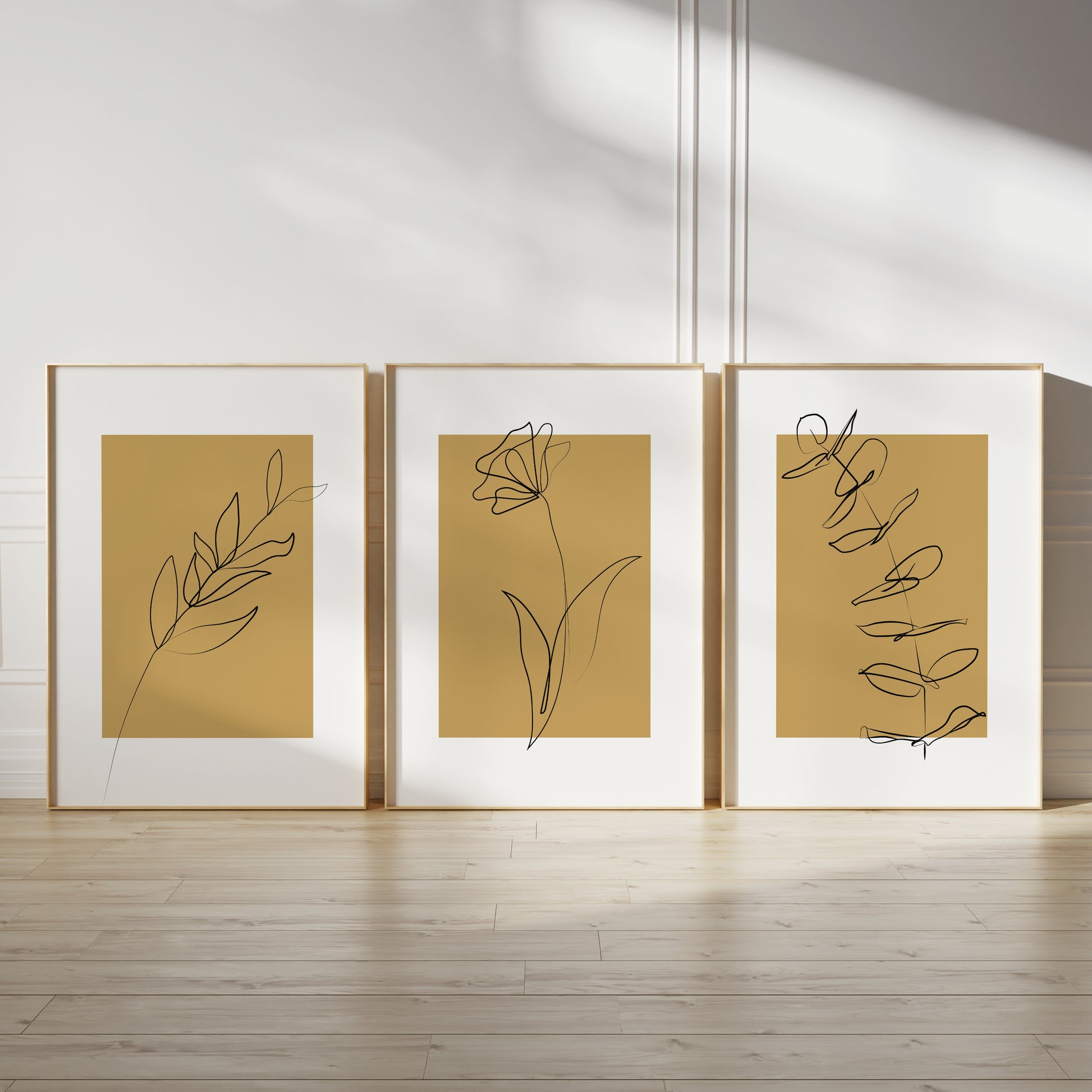 mustard yellow wall art set with line drawn plants