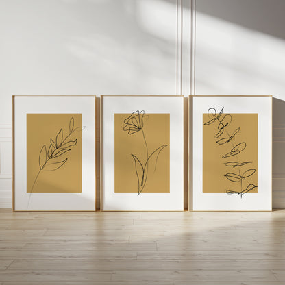 mustard yellow wall art set with line drawn plants