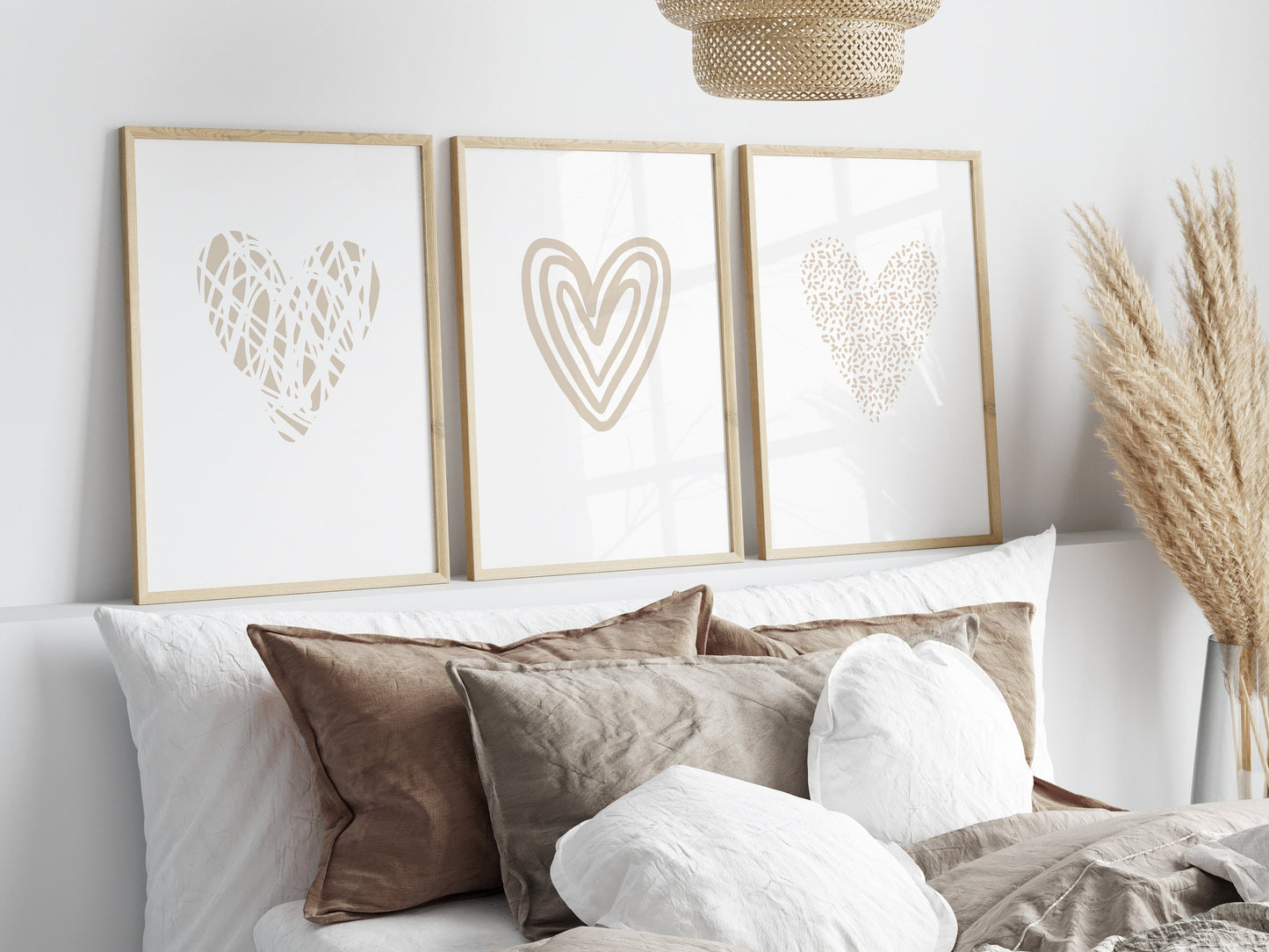 bedroom wall art set in a minimalist style each with beige love heart on a white background