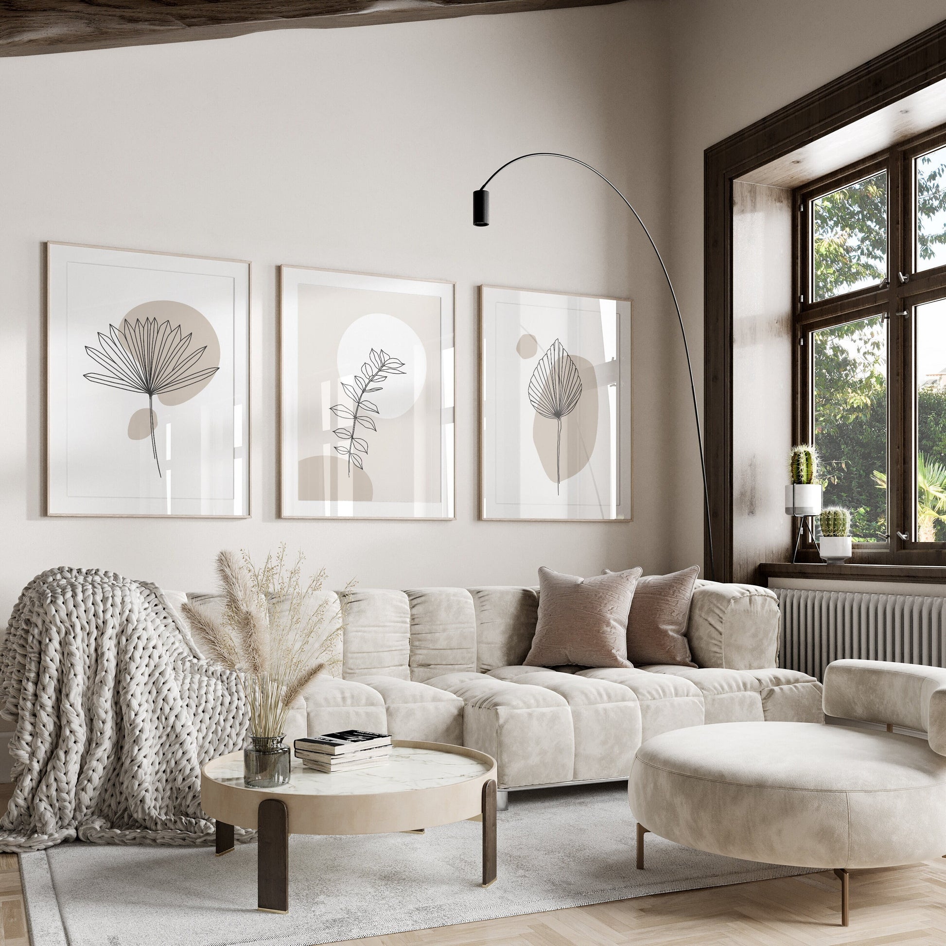 Living room wall art, set of three unframed prints in shades of beige and white featuring plant illustrations